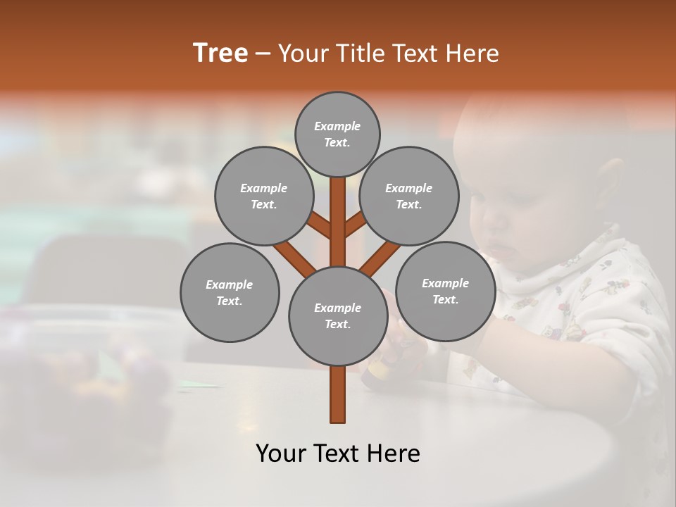 A Baby Sitting At A Table Playing With A Toy PowerPoint Template