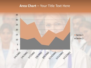 Female Doctor Smiling In A Hospital With Her Team Behind PowerPoint Template