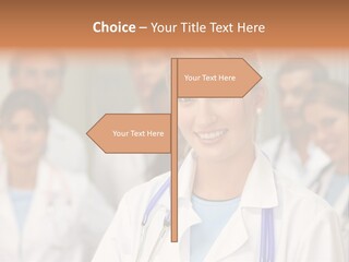 Female Doctor Smiling In A Hospital With Her Team Behind PowerPoint Template