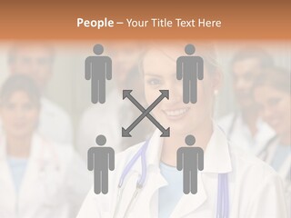 Female Doctor Smiling In A Hospital With Her Team Behind PowerPoint Template