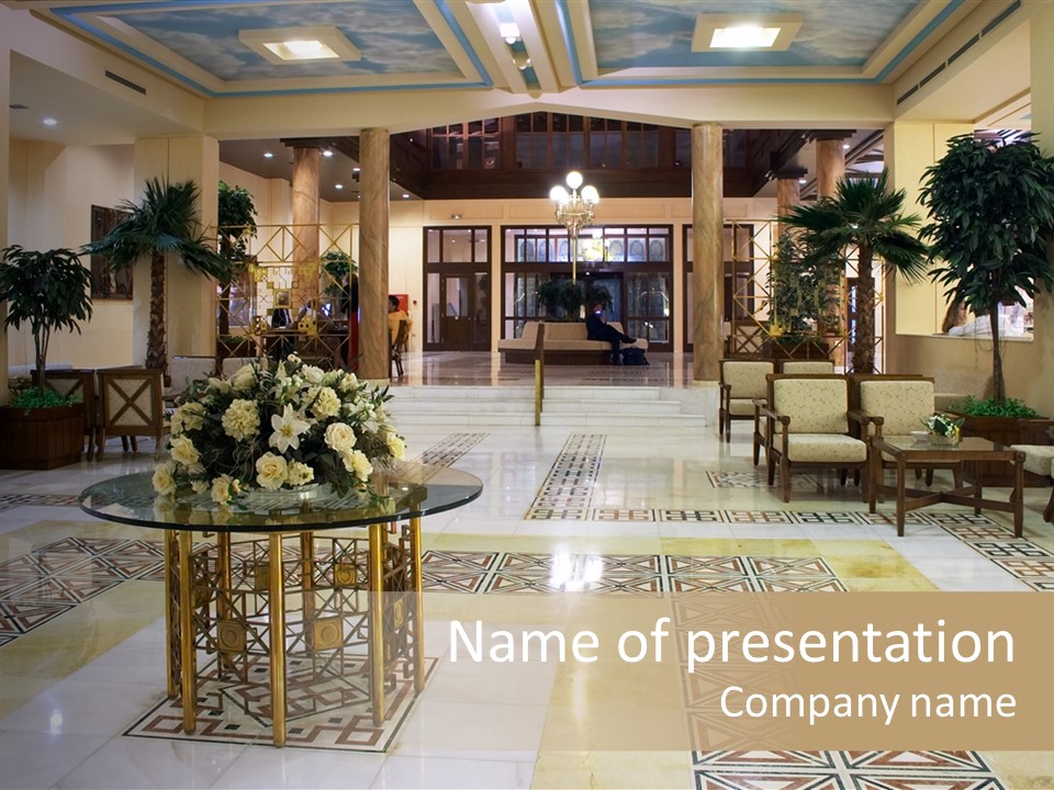 Hall In Hotel With Marble Floor And Flowers On The Table PowerPoint Template