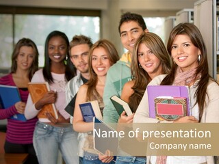 Group Of Students At A Library Smiling And Holding Some Notebooks PowerPoint Template