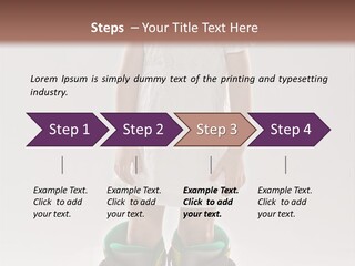 Funny Little Girl In Big Mountain Ski Boots And Short White Dress Stands On White Background PowerPoint Template