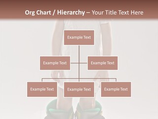 Funny Little Girl In Big Mountain Ski Boots And Short White Dress Stands On White Background PowerPoint Template