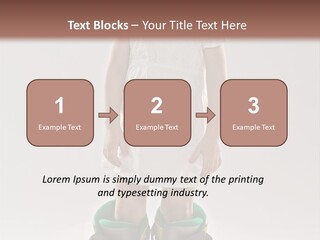 Funny Little Girl In Big Mountain Ski Boots And Short White Dress Stands On White Background PowerPoint Template