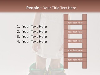 Funny Little Girl In Big Mountain Ski Boots And Short White Dress Stands On White Background PowerPoint Template