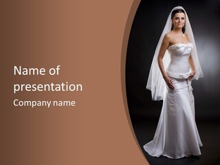 Studio Portrait Of A Young Bride Wearing White Wedding Dress With Veil, Smiling And Looking At Camera. PowerPoint Template