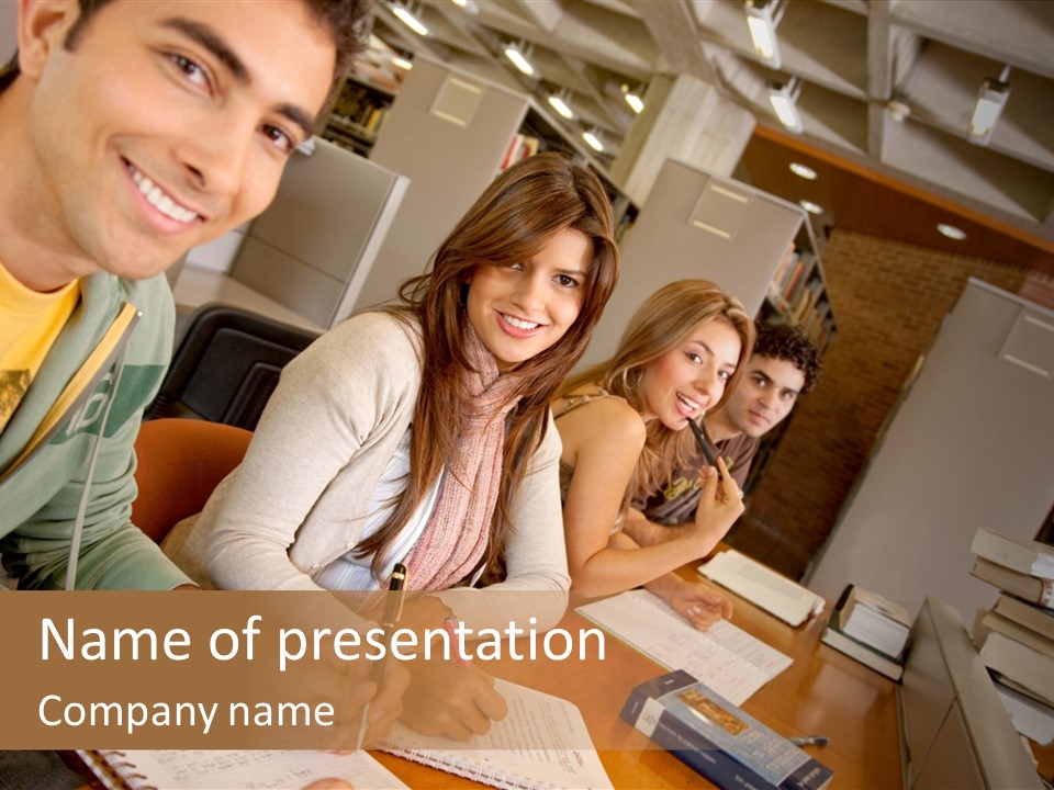 Small Group Of Students At A Library Studying PowerPoint Template