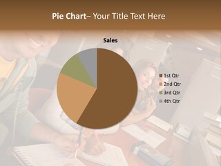 Small Group Of Students At A Library Studying PowerPoint Template