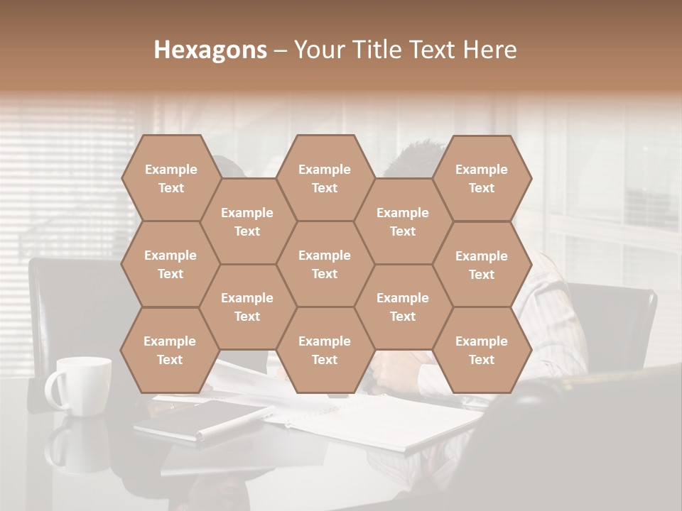 A Man And A Woman Sitting At A Table In Front Of A Laptop PowerPoint Template