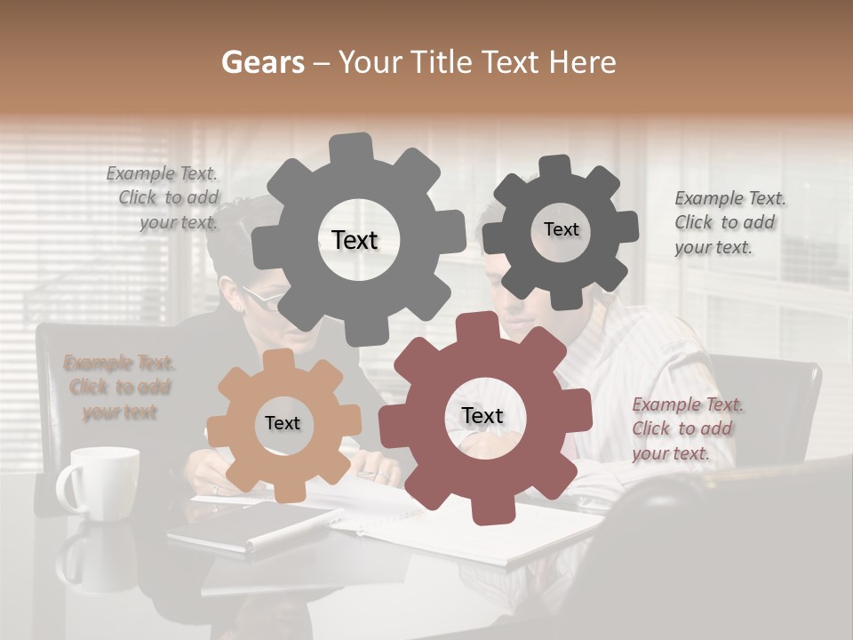 A Man And A Woman Sitting At A Table In Front Of A Laptop PowerPoint Template