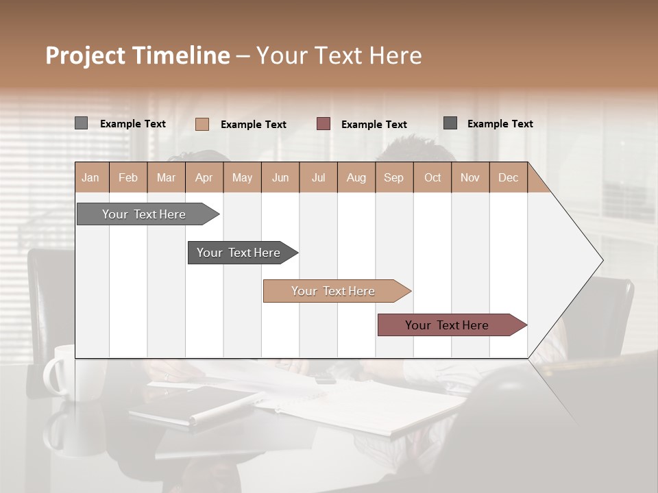 A Man And A Woman Sitting At A Table In Front Of A Laptop PowerPoint Template