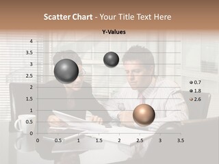 A Man And A Woman Sitting At A Table In Front Of A Laptop PowerPoint Template