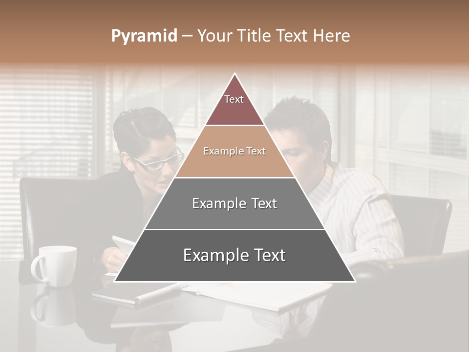 A Man And A Woman Sitting At A Table In Front Of A Laptop PowerPoint Template