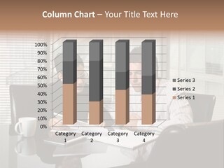 A Man And A Woman Sitting At A Table In Front Of A Laptop PowerPoint Template