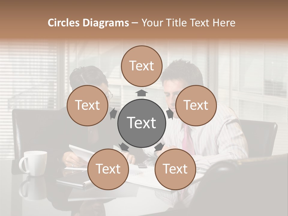 A Man And A Woman Sitting At A Table In Front Of A Laptop PowerPoint Template