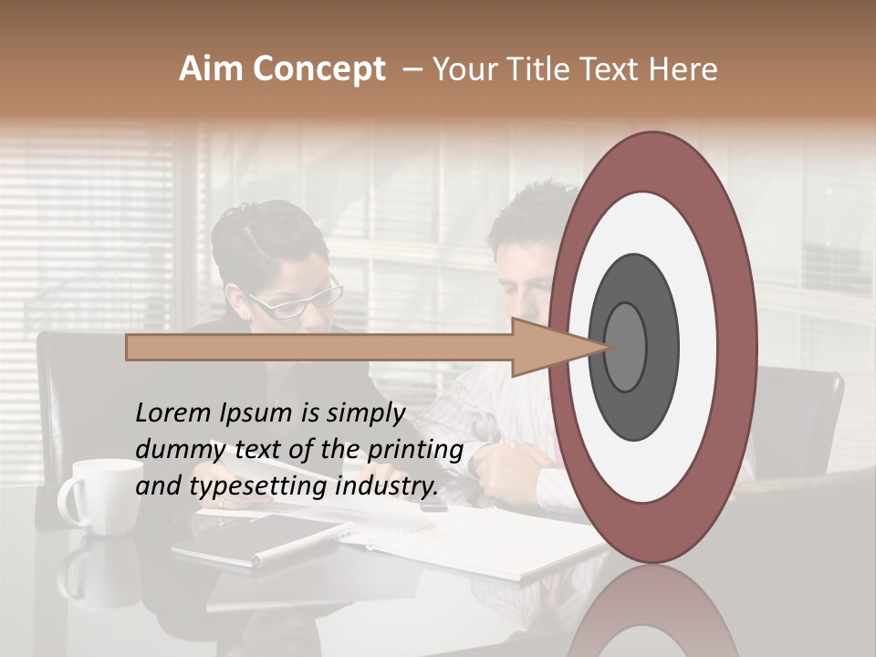 A Man And A Woman Sitting At A Table In Front Of A Laptop PowerPoint Template