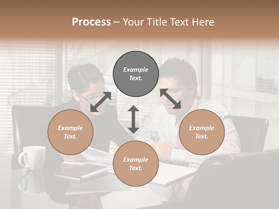 A Man And A Woman Sitting At A Table In Front Of A Laptop PowerPoint Template