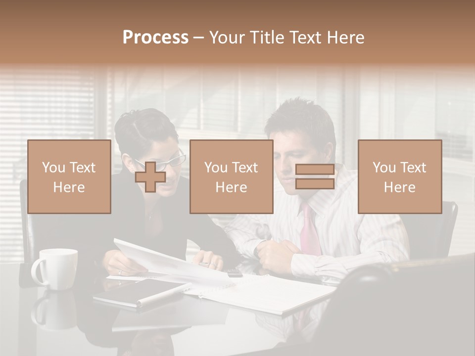 A Man And A Woman Sitting At A Table In Front Of A Laptop PowerPoint Template