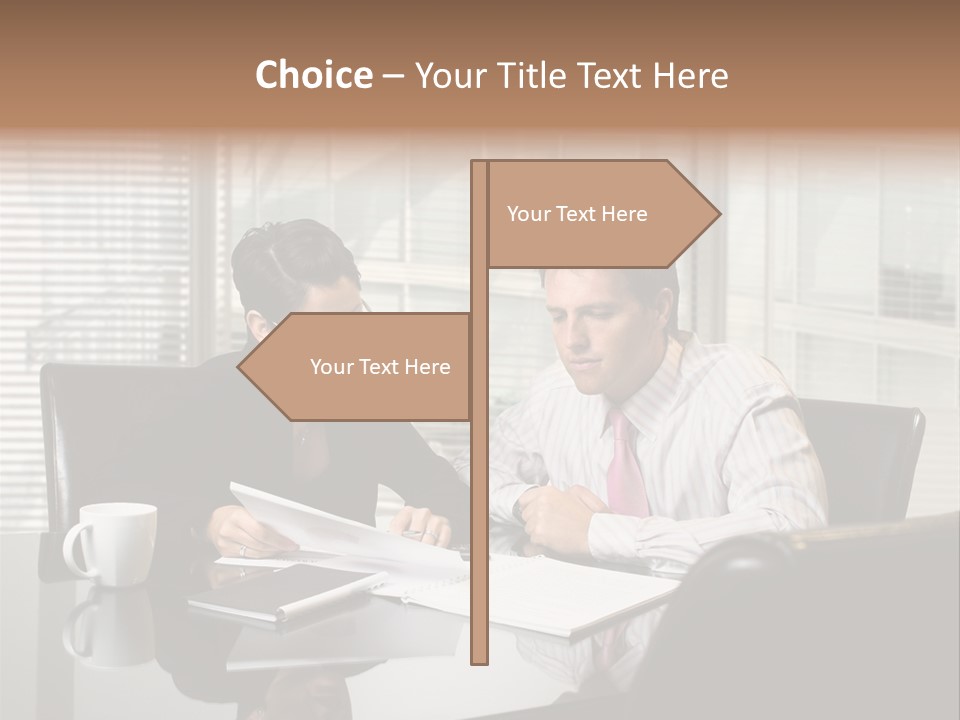 A Man And A Woman Sitting At A Table In Front Of A Laptop PowerPoint Template