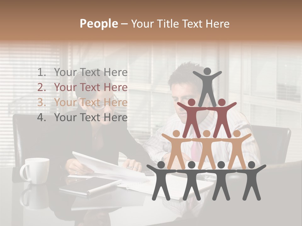 A Man And A Woman Sitting At A Table In Front Of A Laptop PowerPoint Template