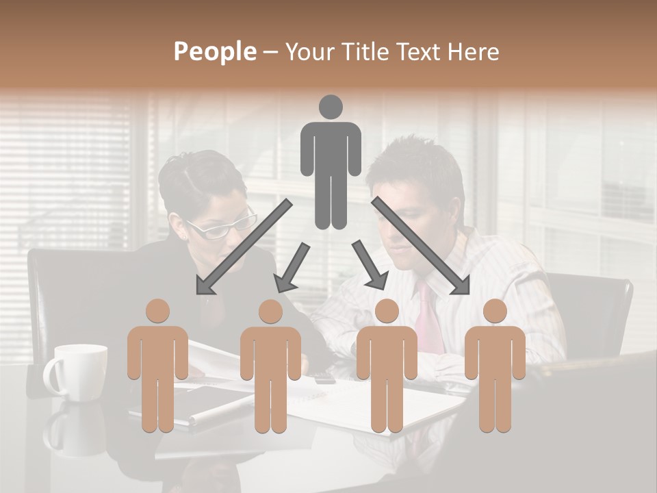 A Man And A Woman Sitting At A Table In Front Of A Laptop PowerPoint Template