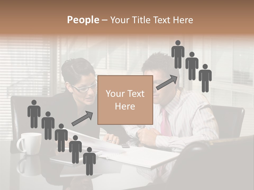 A Man And A Woman Sitting At A Table In Front Of A Laptop PowerPoint Template