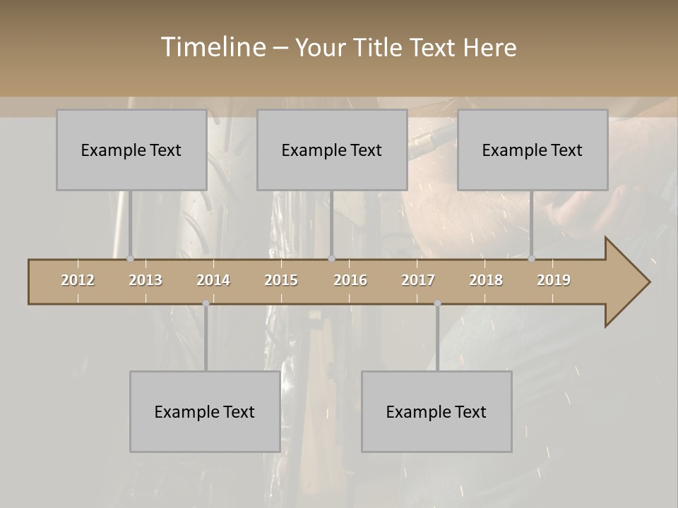 Welder Working On The Metal Fork Of A Motorcycle PowerPoint Template