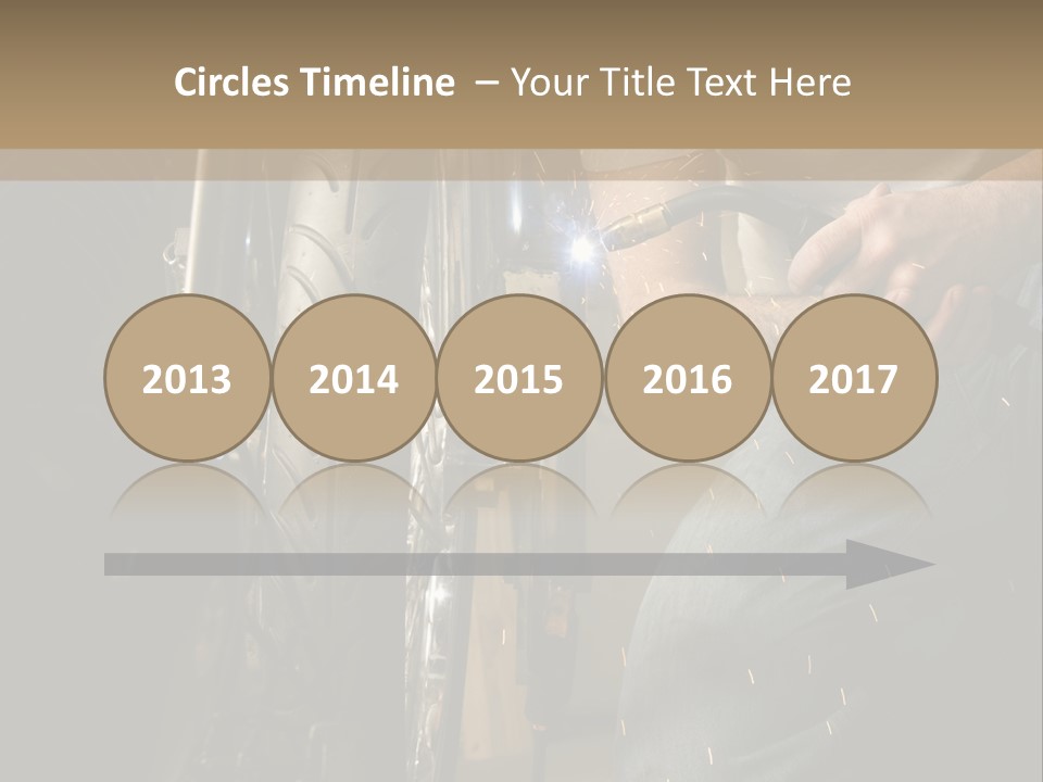 Welder Working On The Metal Fork Of A Motorcycle PowerPoint Template