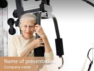 Senior Woman With Fitness Machine Over White Background. Shallow Dof. PowerPoint Template