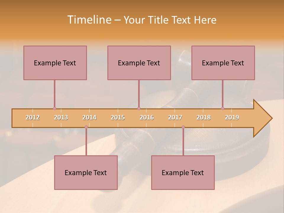 A Judge's Gaven Sitting On Top Of A Table In Front Of A PowerPoint Template