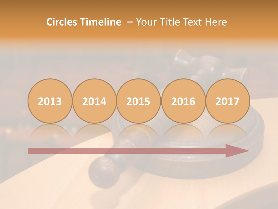 A Judge's Gaven Sitting On Top Of A Table In Front Of A PowerPoint Template