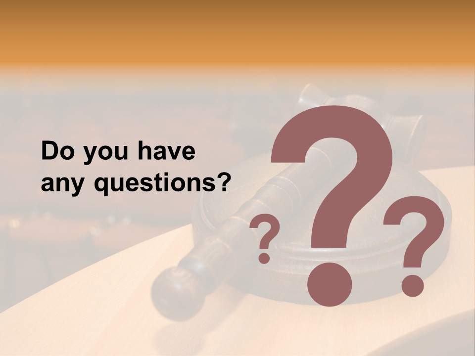 A Judge's Gaven Sitting On Top Of A Table In Front Of A PowerPoint Template