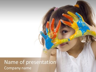 A Little Girl Holding Her Hands Up To Her Face PowerPoint Template