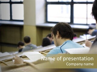 Students At The University During Exam PowerPoint Template