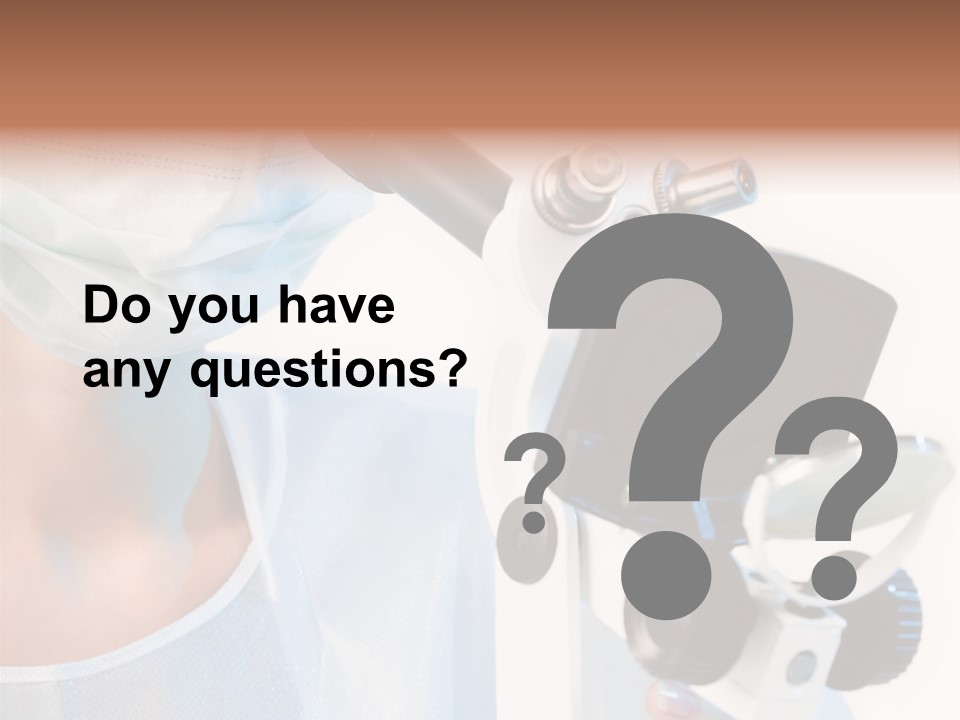 Portrait Of Medical Student Looking Through Microscope In Laboratory PowerPoint Template