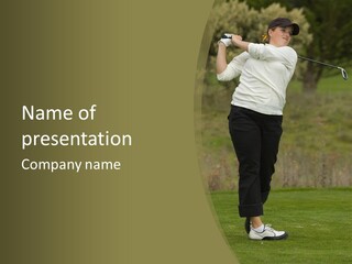 Female Golfer Captured In Her Follow Through Swing. PowerPoint Template