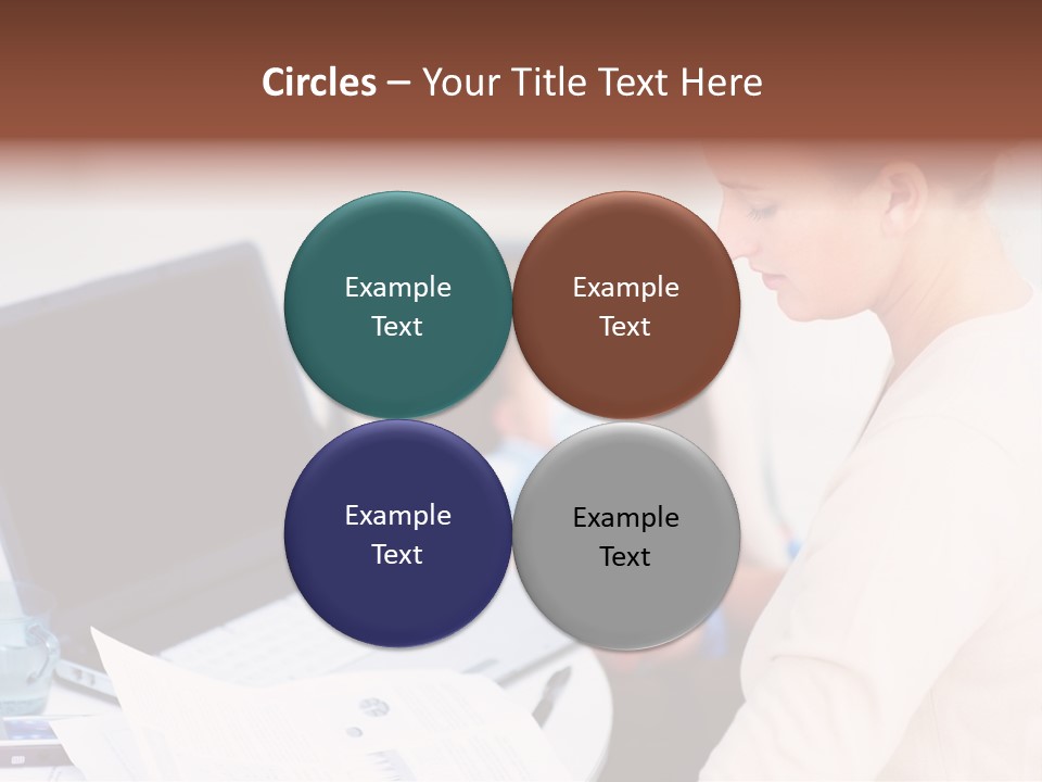 A Woman Holding A Baby In Her Lap While Looking At A Laptop PowerPoint Template