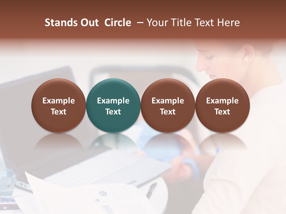 A Woman Holding A Baby In Her Lap While Looking At A Laptop PowerPoint Template