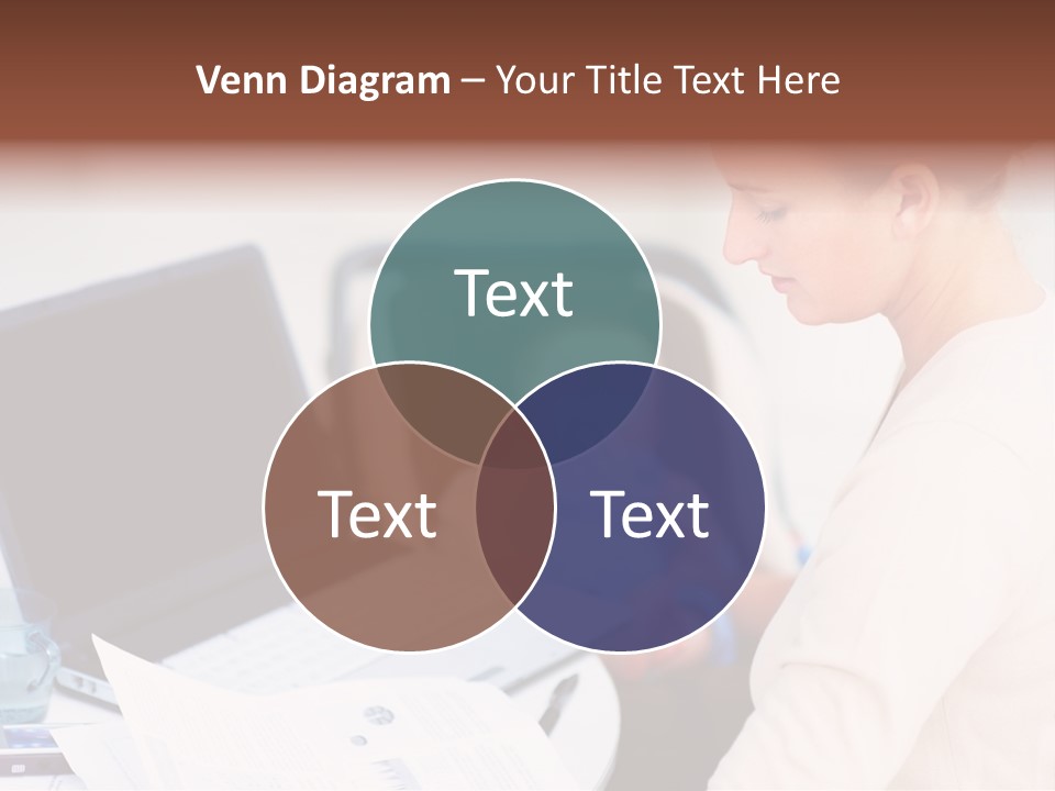 A Woman Holding A Baby In Her Lap While Looking At A Laptop PowerPoint Template