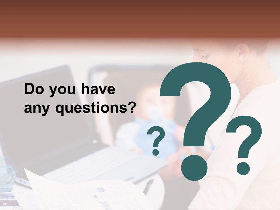 A Woman Holding A Baby In Her Lap While Looking At A Laptop PowerPoint Template