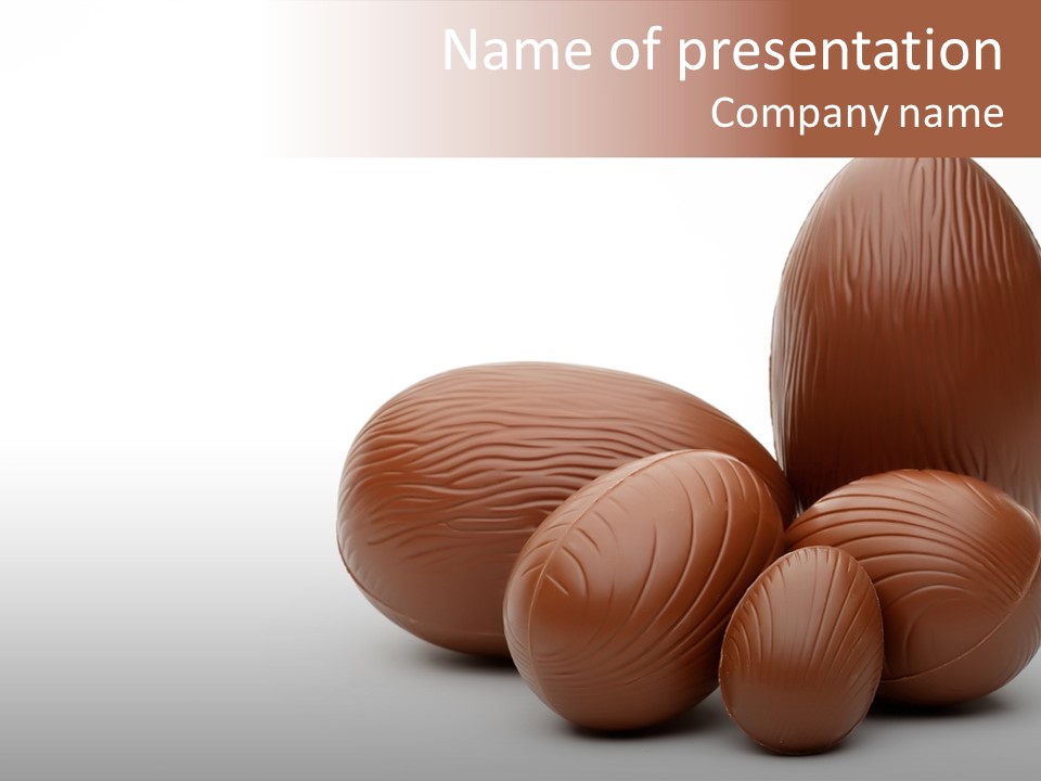 Chocolate Easter Eggs On Isolated White PowerPoint Template