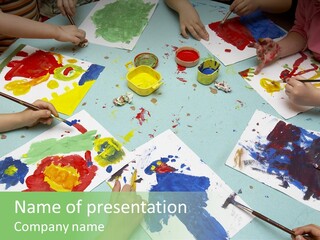 Little Children Painting During Art Class PowerPoint Template