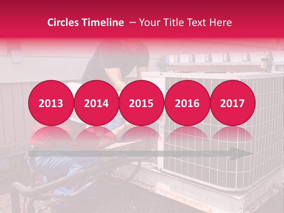 Two Workers On The Roof Of A Building Working On The Air Conditioning Unit. PowerPoint Template