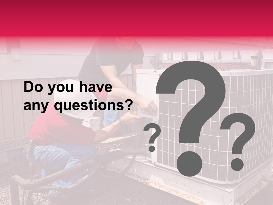 Two Workers On The Roof Of A Building Working On The Air Conditioning Unit. PowerPoint Template