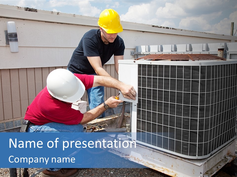 Two Workers On The Roof Of A Building Working On The Air Conditioning Unit. PowerPoint Template