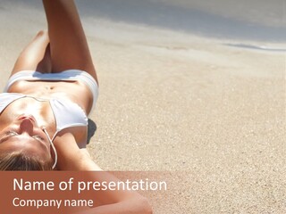 A Woman In A White Bikini Laying On The Beach PowerPoint Template