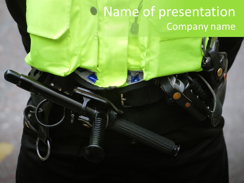 Close-Up Of British Policeman Wearing Protection Equipment PowerPoint Template