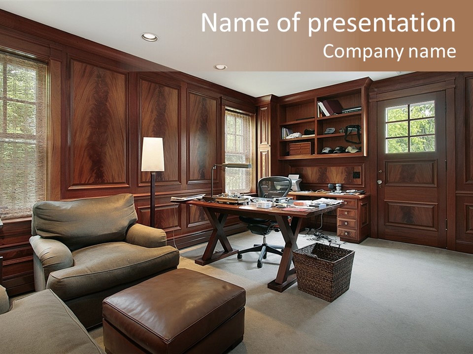 A Home Office With A Leather Chair And A Desk PowerPoint Template