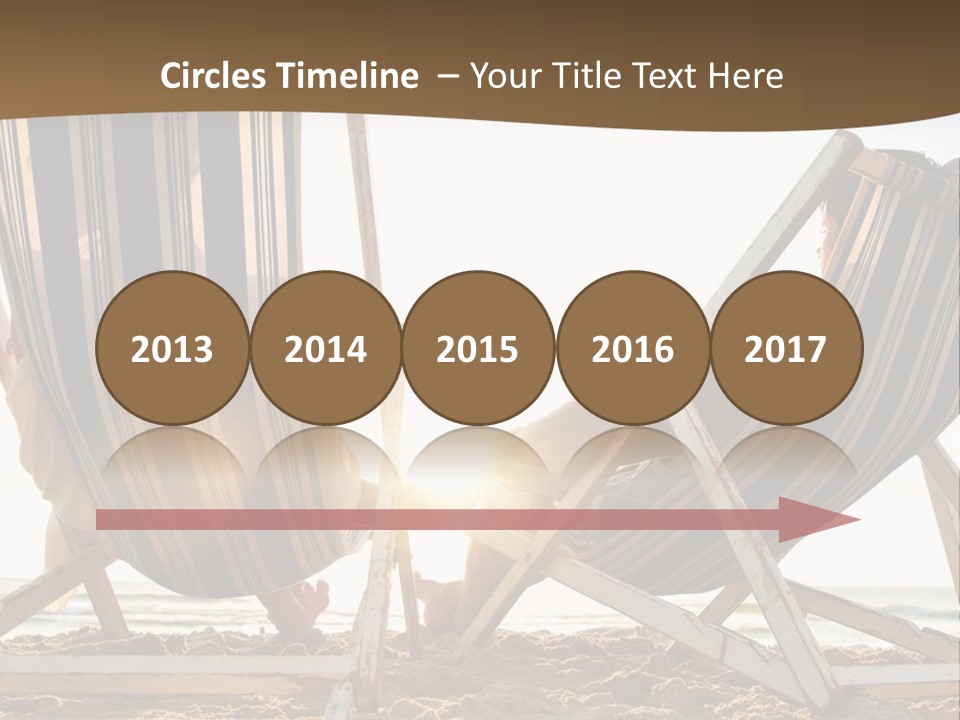 A Person Sitting In A Chair On The Beach PowerPoint Template